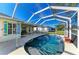 Inviting screened-in pool and patio for outdoor enjoyment and entertaining at 11744 Shirburn Cir, Parrish, FL 34219
