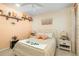 Cozy bedroom with ceiling fan and decor at 12019 Sawgrass Lake Ter, Bradenton, FL 34211