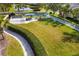 Well maintained dog park with agility equipment and walking path at 12019 Sawgrass Lake Ter, Bradenton, FL 34211