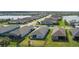 Aerial view of the neighborhood showcasing the community's layout and lakeside homes at 13540 Old Creek Ct, Parrish, FL 34219