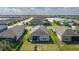 Neighborhood aerial view showcasing the community's layout and lakeside homes at 13540 Old Creek Ct, Parrish, FL 34219