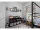 Bright bedroom features playful décor, including dinosaur-themed artwork and an alphabet rug at 13540 Old Creek Ct, Parrish, FL 34219