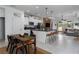 Open kitchen featuring a breakfast bar, stainless appliances, and direct view of the living room at 13540 Old Creek Ct, Parrish, FL 34219