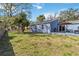 Spacious, green backyard with lawn and outdoor patio at 1367 21St St, Sarasota, FL 34234