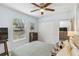 Comfortable bedroom with a double closet, soft bedding, and natural light at 1367 21St St, Sarasota, FL 34234