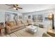 Bright living room with a large comfortable sectional sofa and neutral decor at 1367 21St St, Sarasota, FL 34234