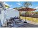Outdoor deck with umbrella shaded seating, perfect for relaxing at 1367 21St St, Sarasota, FL 34234