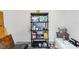 Storage unit filled with cleaning and kitchen supplies, with a bin and other loose items at 1367 21St St, Sarasota, FL 34234