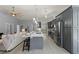 Modern kitchen with stainless steel appliances and open floor plan at 14730 1St E Ave, Bradenton, FL 34212