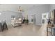 Spacious living room with tile flooring and neutral decor throughout at 14730 1St E Ave, Bradenton, FL 34212