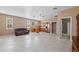 Living area showing kitchen, access to bathroom, and comfortable lounge space at 14730 1St E Ave, Bradenton, FL 34212