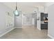 Open living space with neutral walls, tile flooring, and natural light at 14730 1St E Ave, Bradenton, FL 34212