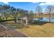 Community picnic pavilion offers scenic views of the adjacent lake and features picnic tables for outdoor enjoyment at 14730 1St E Ave, Bradenton, FL 34212