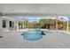 Enclosed lanai featuring a private pool and spa, perfect for outdoor entertaining and relaxation at 14730 1St E Ave, Bradenton, FL 34212