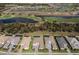 Expansive community aerial shot features golf course views and pristine home exteriors at 14803 Derna Ter, Bradenton, FL 34211