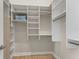 Spacious walk-in closet with ample shelving and storage for an organized wardrobe at 14803 Derna Ter, Bradenton, FL 34211