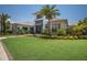 Well-manicured lawn surrounds this impressive modern building at 14803 Derna Ter, Bradenton, FL 34211