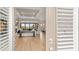 Living Room showcases a stunning view with neutral colors, wood floors, and modern furniture at 14803 Derna Ter, Bradenton, FL 34211
