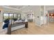 Inviting open-concept living area with large windows, modern furnishings, and elegant decor at 14803 Derna Ter, Bradenton, FL 34211