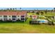 Beautiful condo building overlooking lush landscaping and community pool at 1620 Fairway Trce # B, Palmetto, FL 34221