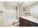 Bathroom featuring granite counters, shower and bath combo, and updated fixtures at 209 111Th E St, Bradenton, FL 34212