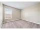 Cozy bedroom featuring carpeted floor and a window with blinds at 209 111Th E St, Bradenton, FL 34212