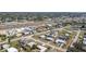Wide angle aerial shot of a neighborhood with charming single-Gathering homes and proximity to commercial areas at 211 Dalton Blvd, Port Charlotte, FL 33952