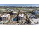 Stunning aerial view of luxury condos, pools, and landscaping with ocean and golf course views at 2141 Gulf Of Mexico Dr Unit # 4, Longboat Key, FL 34228