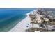Enjoy aerial views of the pristine beach, with clear ocean views and nearby condo building at 2141 Gulf Of Mexico Dr Unit # 4, Longboat Key, FL 34228