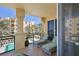Balcony featuring lounge chairs, glass railing, and views of the pool at 2141 Gulf Of Mexico Dr Unit # 4, Longboat Key, FL 34228