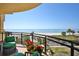 Lovely balcony with ocean views and comfortable chairs overlooking the pristine beach at 2141 Gulf Of Mexico Dr Unit # 4, Longboat Key, FL 34228