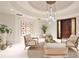 Bright lobby with accent lighting, comfortable seating, and elegant decor at 2141 Gulf Of Mexico Dr Unit # 4, Longboat Key, FL 34228