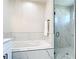 A bright bathroom features a modern soaking tub and glass enclosed shower at 2186 Yalta Ter, North Port, FL 34286