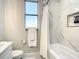 Elegant bathroom features marble tiling in the shower and walls, a window for natural light, and modern fixtures at 2186 Yalta Ter, North Port, FL 34286