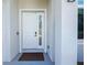 Stylish front door with sidelight, offers a bright and welcoming entrance at 2186 Yalta Ter, North Port, FL 34286