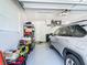 Well-organized garage with epoxy flooring provides ample storage and parking at 2186 Yalta Ter, North Port, FL 34286