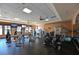 A gym featuring modern equipment and ceiling fans to make your workout a breeze at 322 Winding Brook Ln # 103, Bradenton, FL 34212