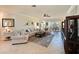 Cozy living room with comfortable seating, neutral decor, and access to the lanai at 322 Winding Brook Ln # 103, Bradenton, FL 34212