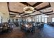 A restaurant with elegant chandeliers, multiple tables, and large windows at 322 Winding Brook Ln # 103, Bradenton, FL 34212