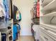 Walk-in closet with built-in shelving and rods for hanging clothes, offering ample storage space at 375 Fairway Isles Ln, Bradenton, FL 34212