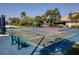 Outdoor shuffleboard court with seating for spectators, perfect for community recreation and leisurely games at 375 Fairway Isles Ln, Bradenton, FL 34212