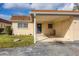 Charming home with a covered carport and well-maintained lawn and garden in a desirable neighborhood at 4608 Park Acres Dr, Bradenton, FL 34207