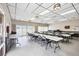 Spacious meeting room featuring ample seating and natural light, ideal for gatherings at 4608 Park Acres Dr, Bradenton, FL 34207