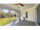 The screened patio overlooks the landscaped yard, adding space for relaxation and entertainment at 16491 Volkerts Ave, Port Charlotte, FL 33954