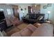 Relaxing living room with a view into another room and comfortable seating at 1750 Palm Springs St, Sarasota, FL 34234
