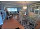 Spacious and inviting living room with an adjacent dining area with modern furnishings at 1750 Palm Springs St, Sarasota, FL 34234