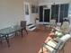 Covered patio furnished with comfortable seating and a relaxing atmosphere at 1750 Palm Springs St, Sarasota, FL 34234