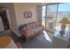 Cozy sunroom with comfortable seating, bright windows, and an inviting atmosphere at 1750 Palm Springs St, Sarasota, FL 34234