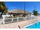 Community amenities include an outdoor tiki bar with poolside seating, great for socializing at 1750 Palm Springs St, Sarasota, FL 34234