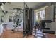 The gym features modern exercise equipment and large mirrors, promoting a healthy and active lifestyle at 231 Hourglass Way # V5, Sarasota, FL 34242